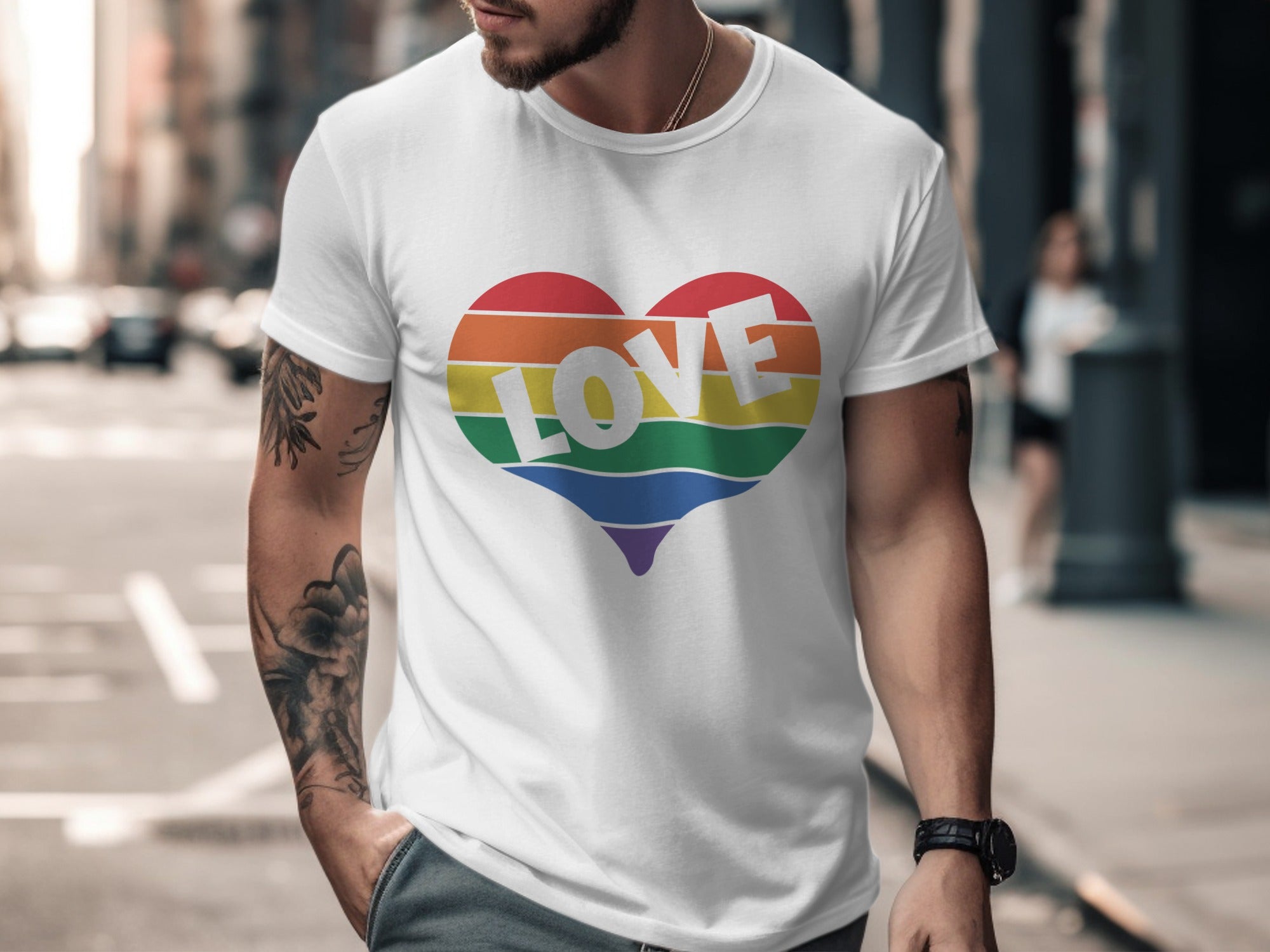 White t-shirt with a rainbow heart graphic that spells "LOVE".