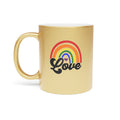 Gold mug with rainbow, purple heart, and black "Love" text.