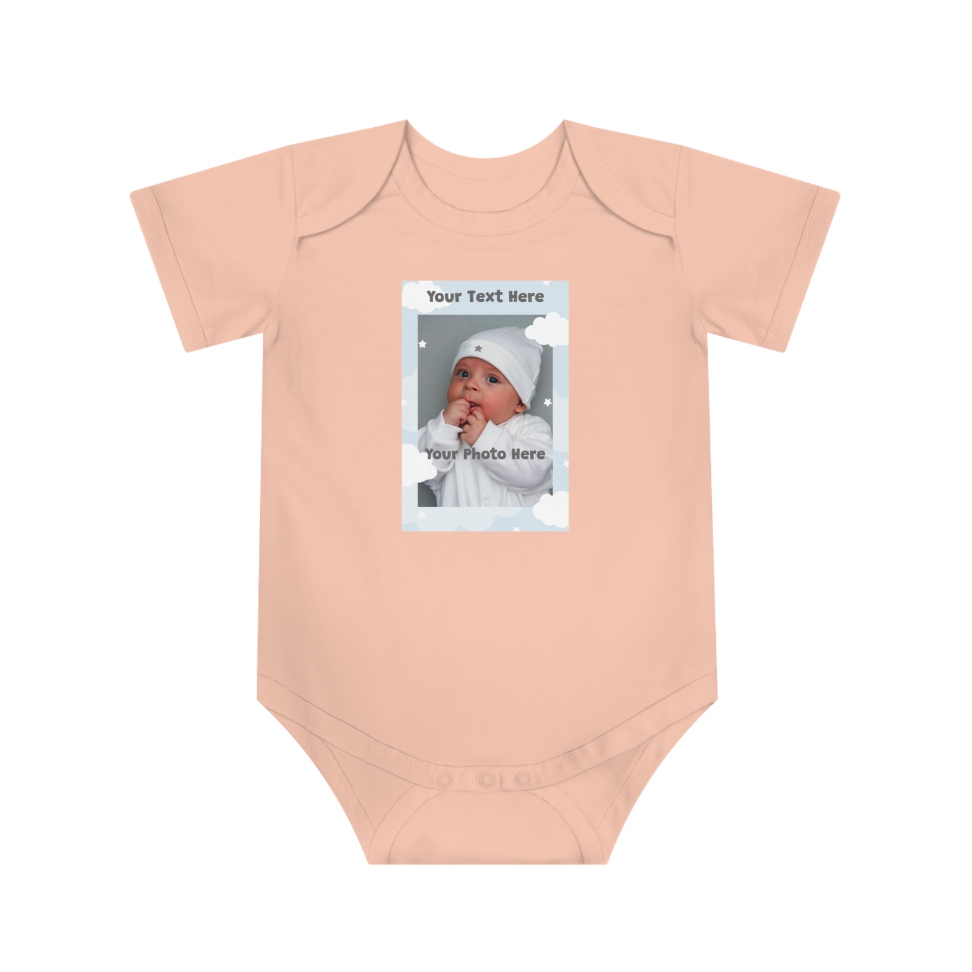Peach newborn onesie with customizable photo frame featuring text "Your Text Here"