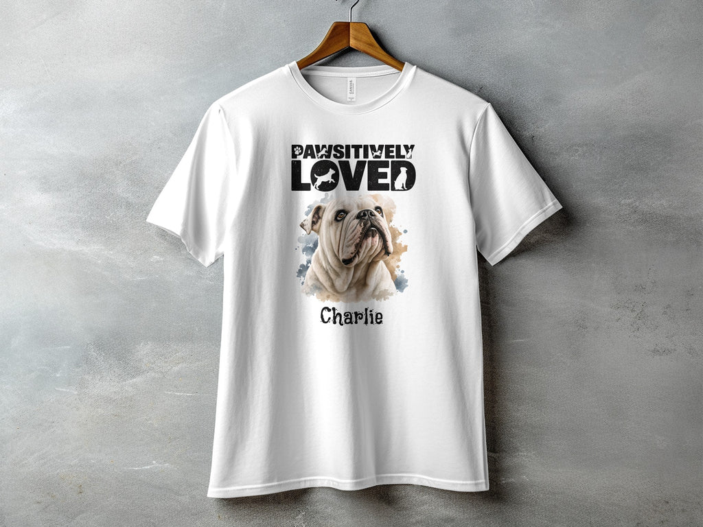 White t-shirt with "PAWSITIVELY LOVED" text and bulldog dog named Charlie.
