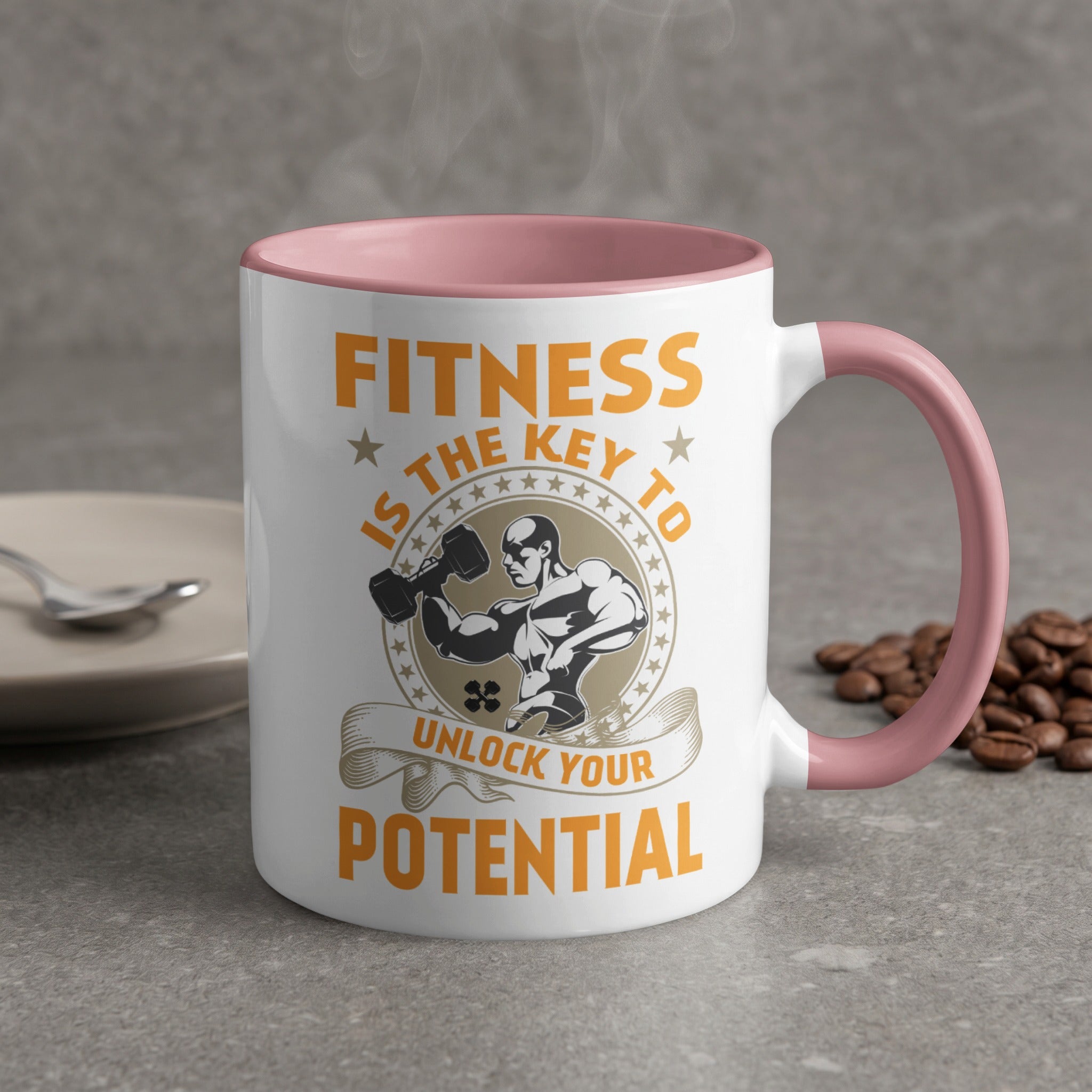 White mug with pink handle, featuring "Fitness is the key to unlock your potential" text and muscle graphic.