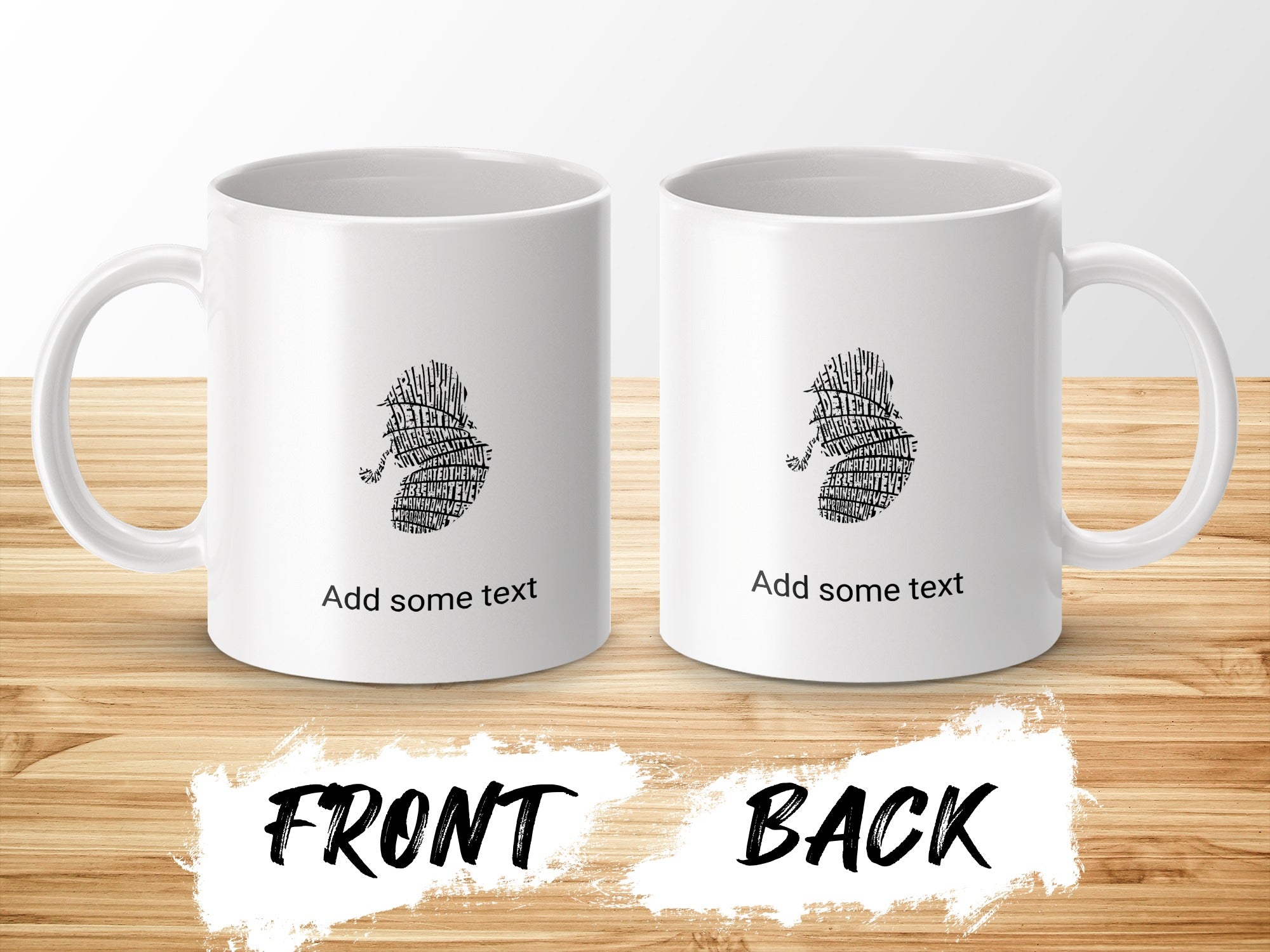 White mugs with black text design, front and back view on wooden surface.