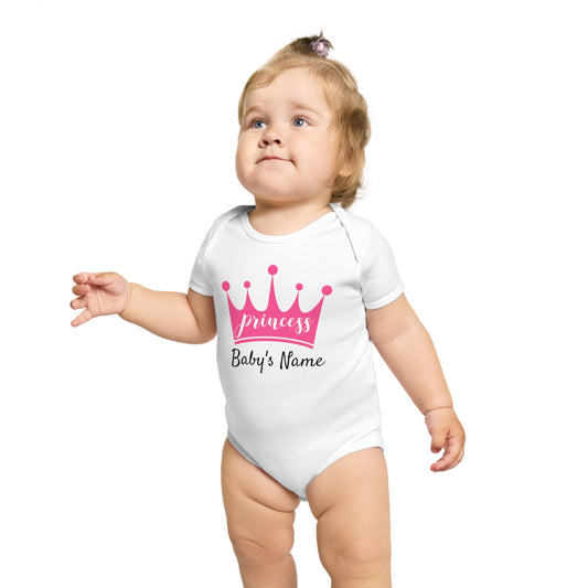 Baby in white onesie with "princess Baby's Name" and crown graphic.