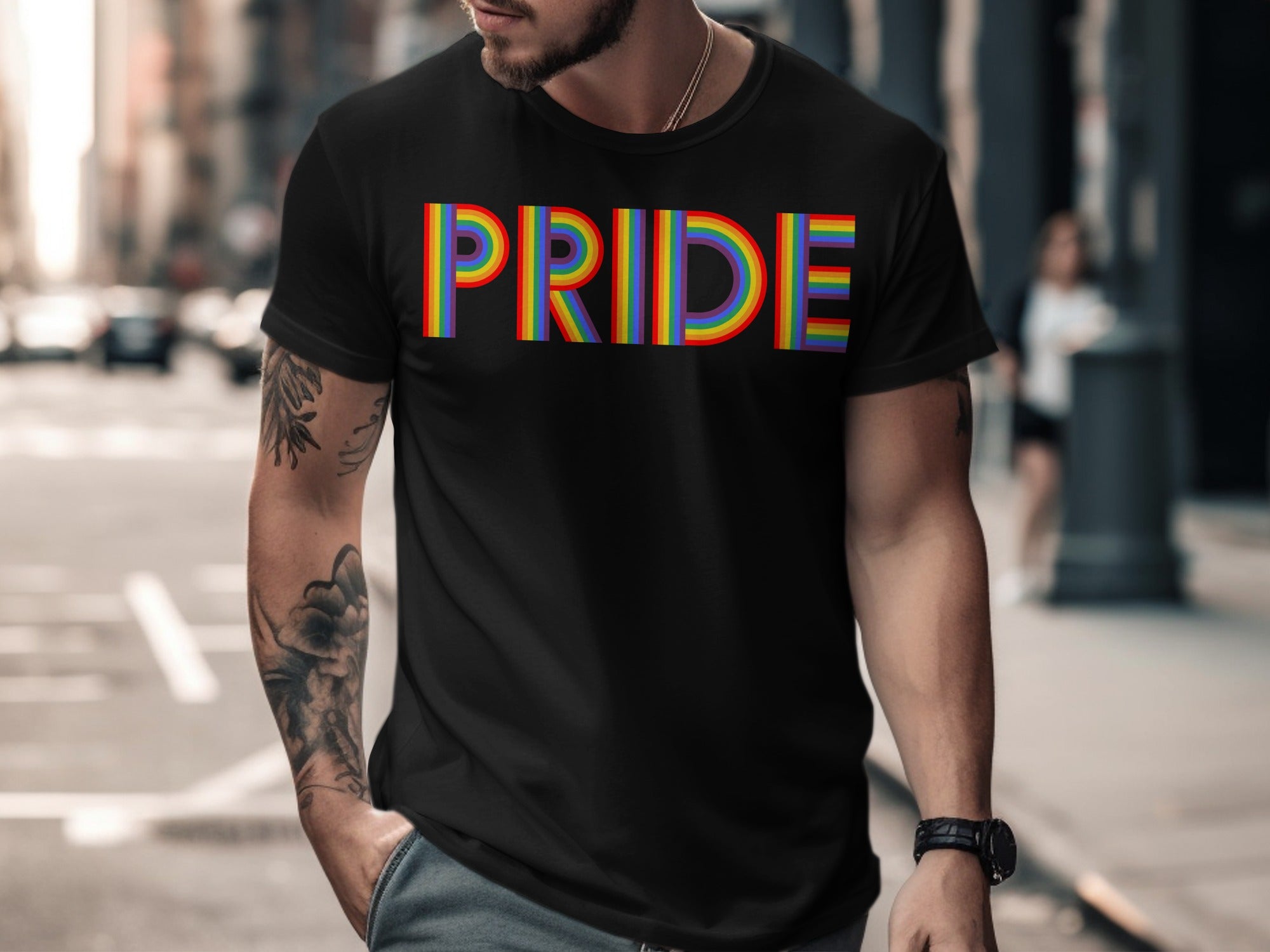 Black t-shirt with "PRIDE" in rainbow stripes across the chest.