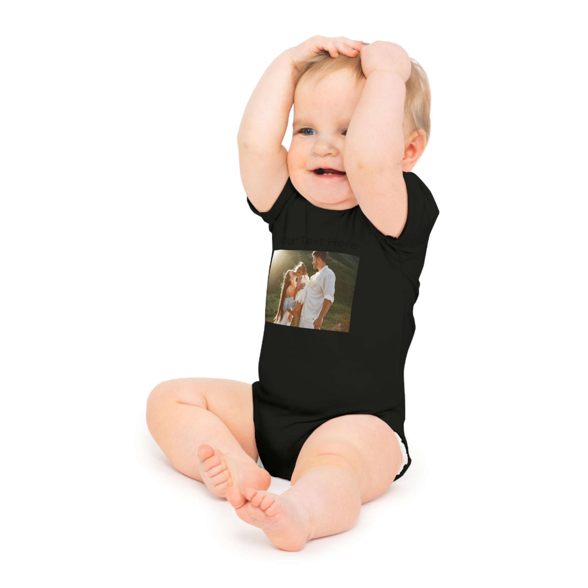 Black baby onesie with a customized photo of a couple and child.