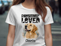 White t-shirt with "PAWSITIVELY LOVED" text, a golden retriever, and "Charlie".