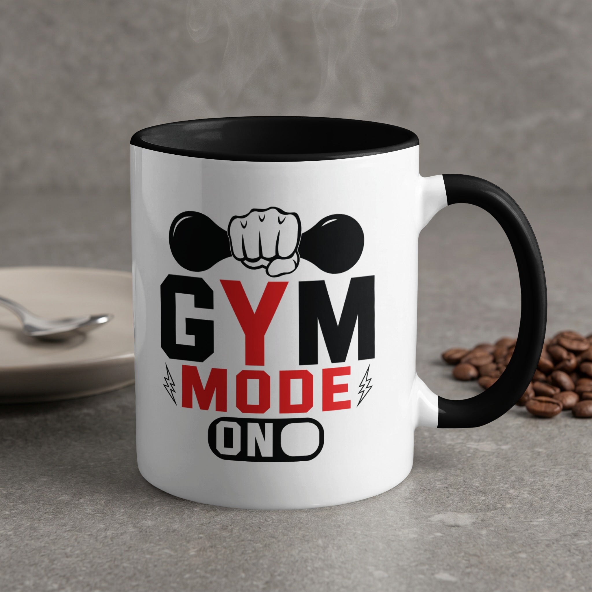 White mug with black rim, "GYM MODE ON" text and dumbbell graphic.
