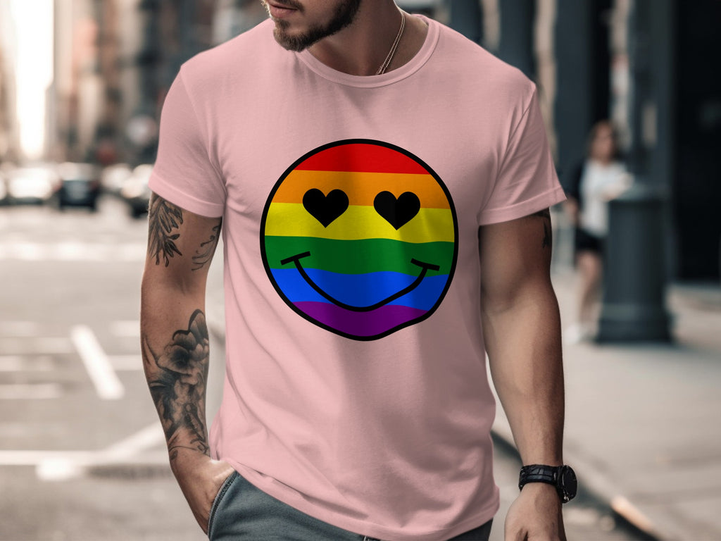 Pink t-shirt with rainbow smiley face design featuring heart eyes.