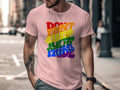 Pink t-shirt with rainbow text "Don't Hide Your Pride."