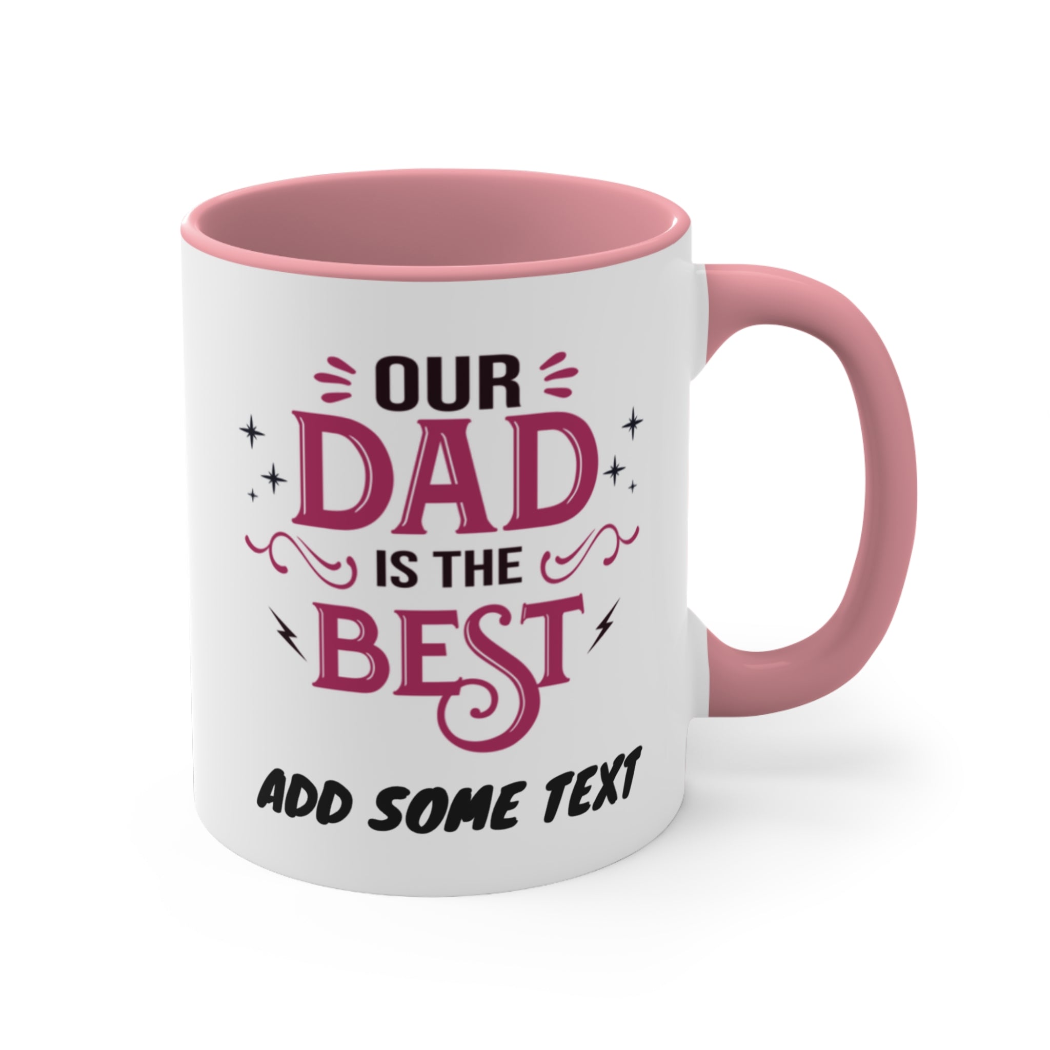White mug with pink handle, "Our Dad is the Best" text.