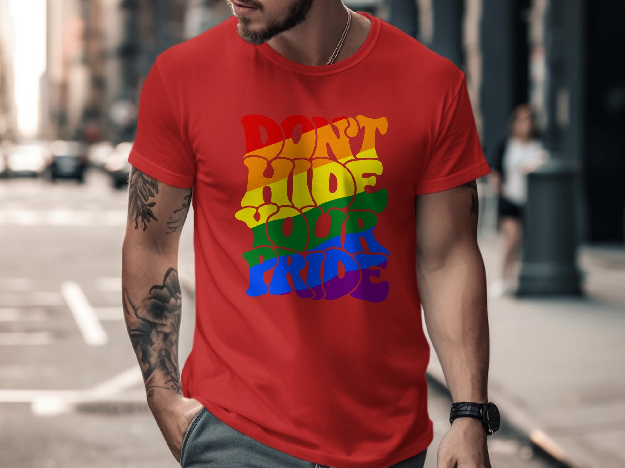 Red t-shirt with "Don't Hide Your Pride" text in rainbow colors.