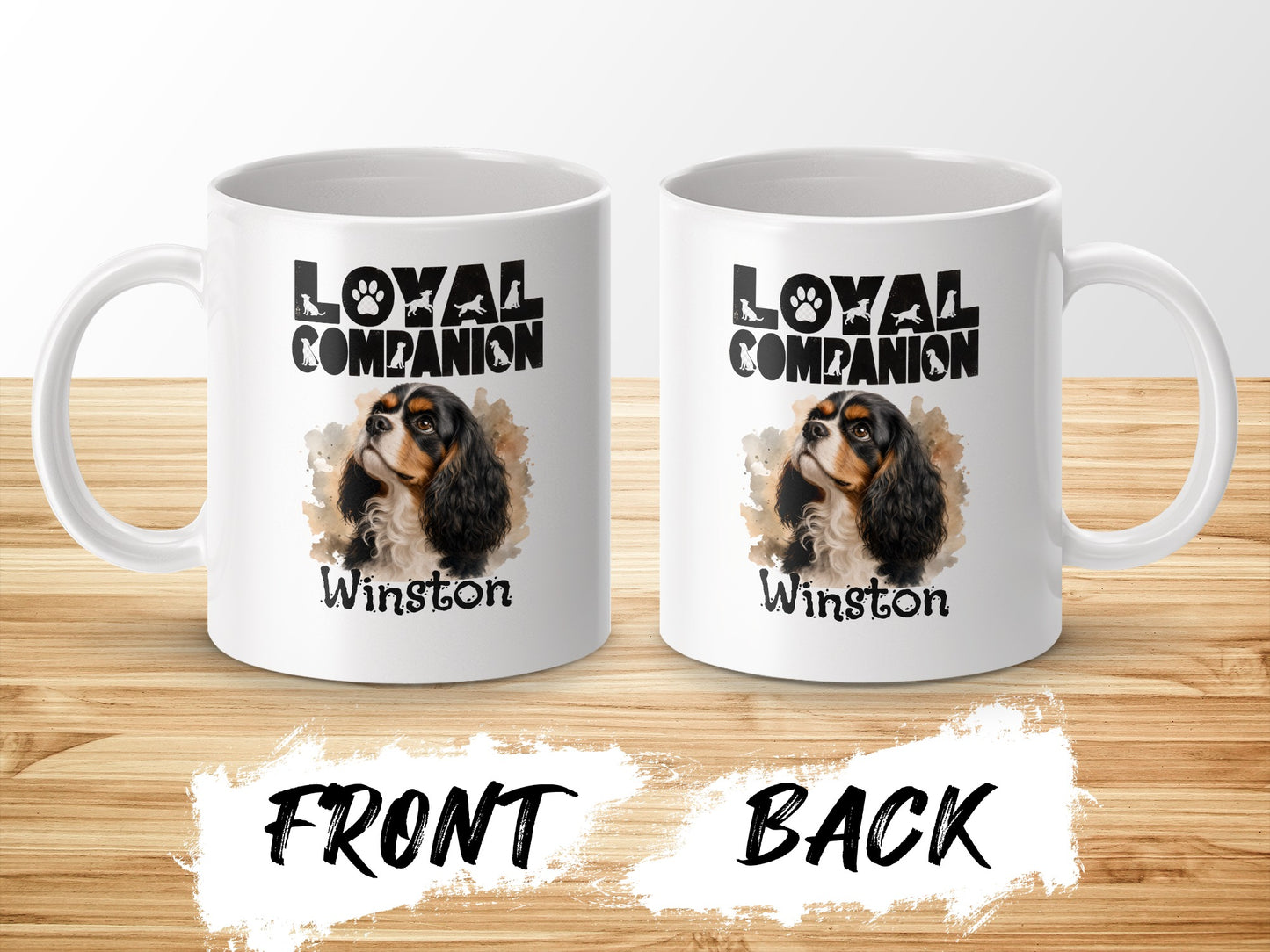 Two white mugs displaying artwork of a Cavalier King Charles Spaniel and "LOYAL COMPANION Winston".