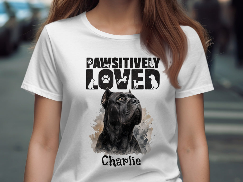 White t-shirt with "Pawsitively Loved" text and a black Cane Corso named Charlie.