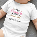 White baby onesie with pink and gold text: The Princess Has Arrived, Babies Name.