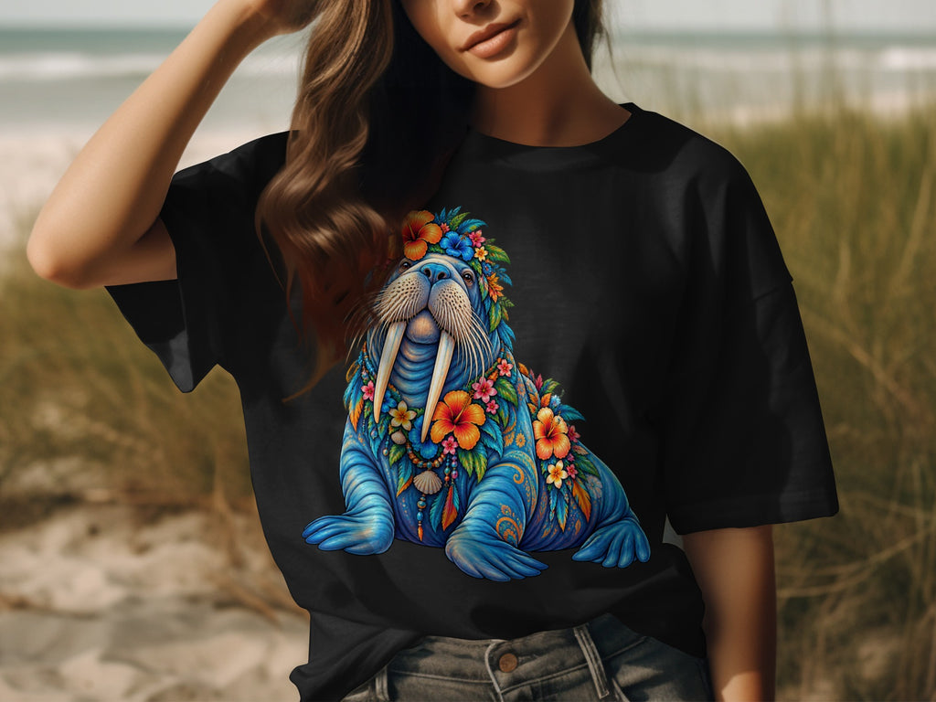 Black t-shirt with a colorful walrus adorned with flowers and shells.