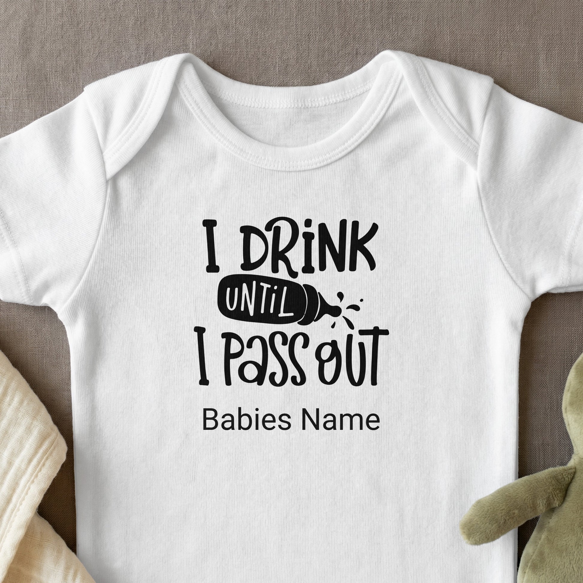 White baby onesie with "I Drink Until I Pass Out" and "Babies Name" text.