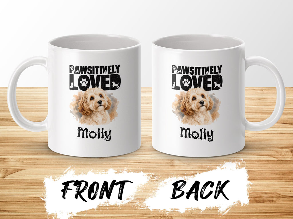 White mugs featuring a dog illustration and "Pawsitively Loved Molly" text.