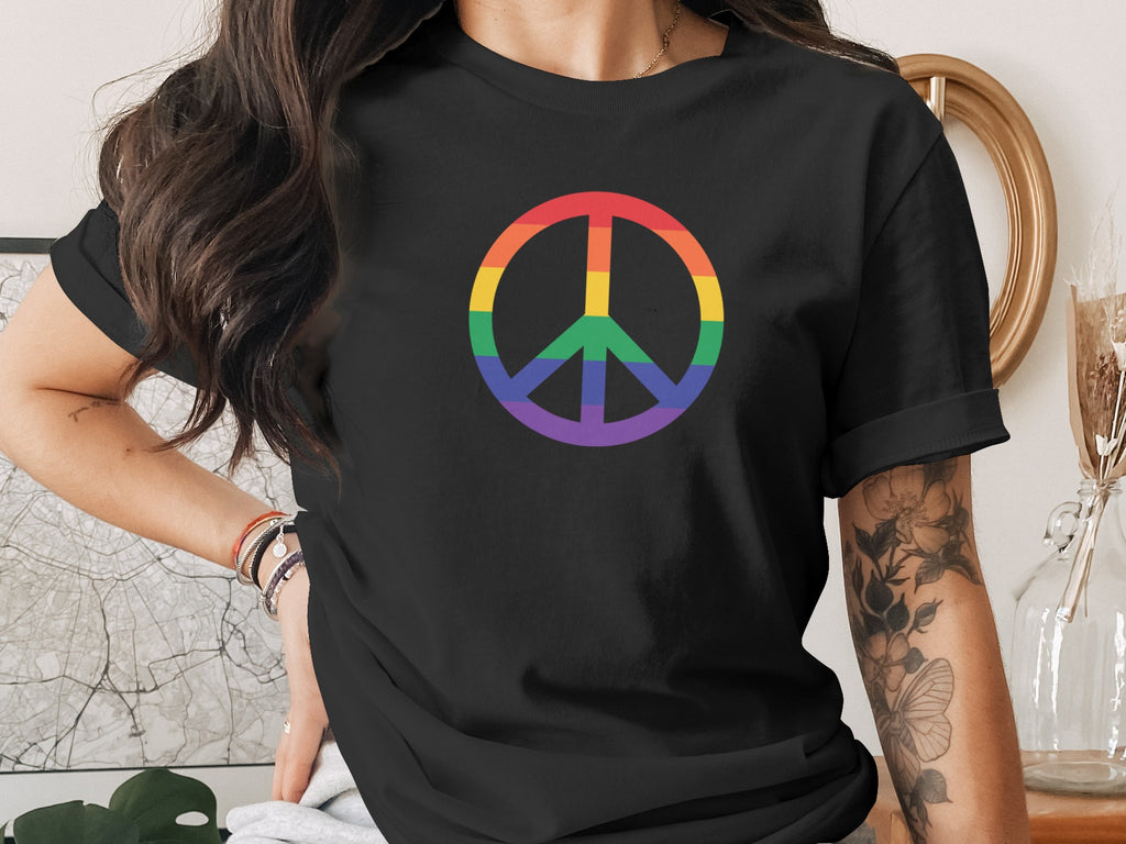 Black t-shirt with rainbow peace symbol design.