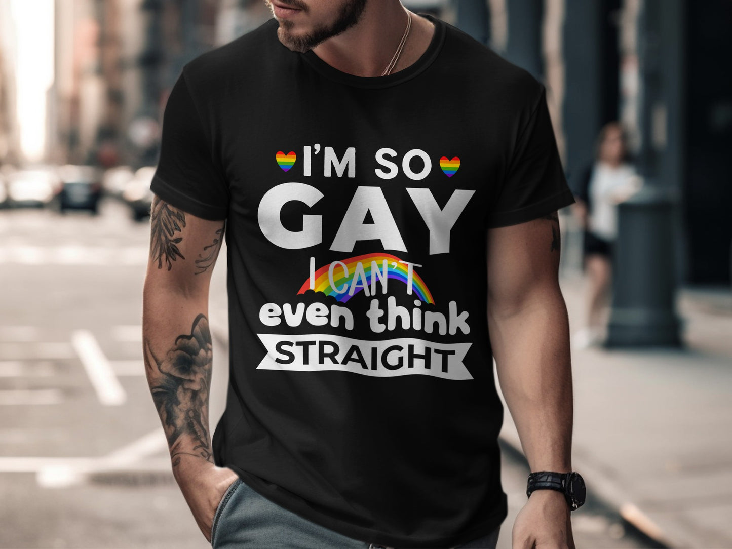 Black t-shirt with "I'm so GAY I can't even think STRAIGHT" text and rainbow accents.