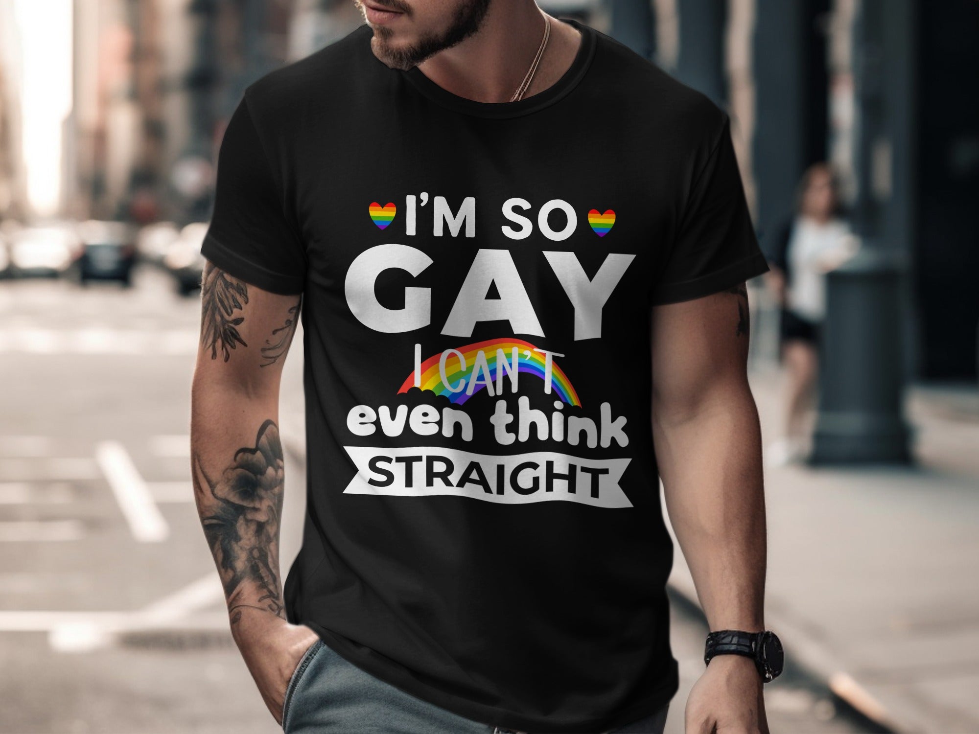 Black t-shirt with "I'm so GAY I can't even think STRAIGHT" text and rainbow accents.