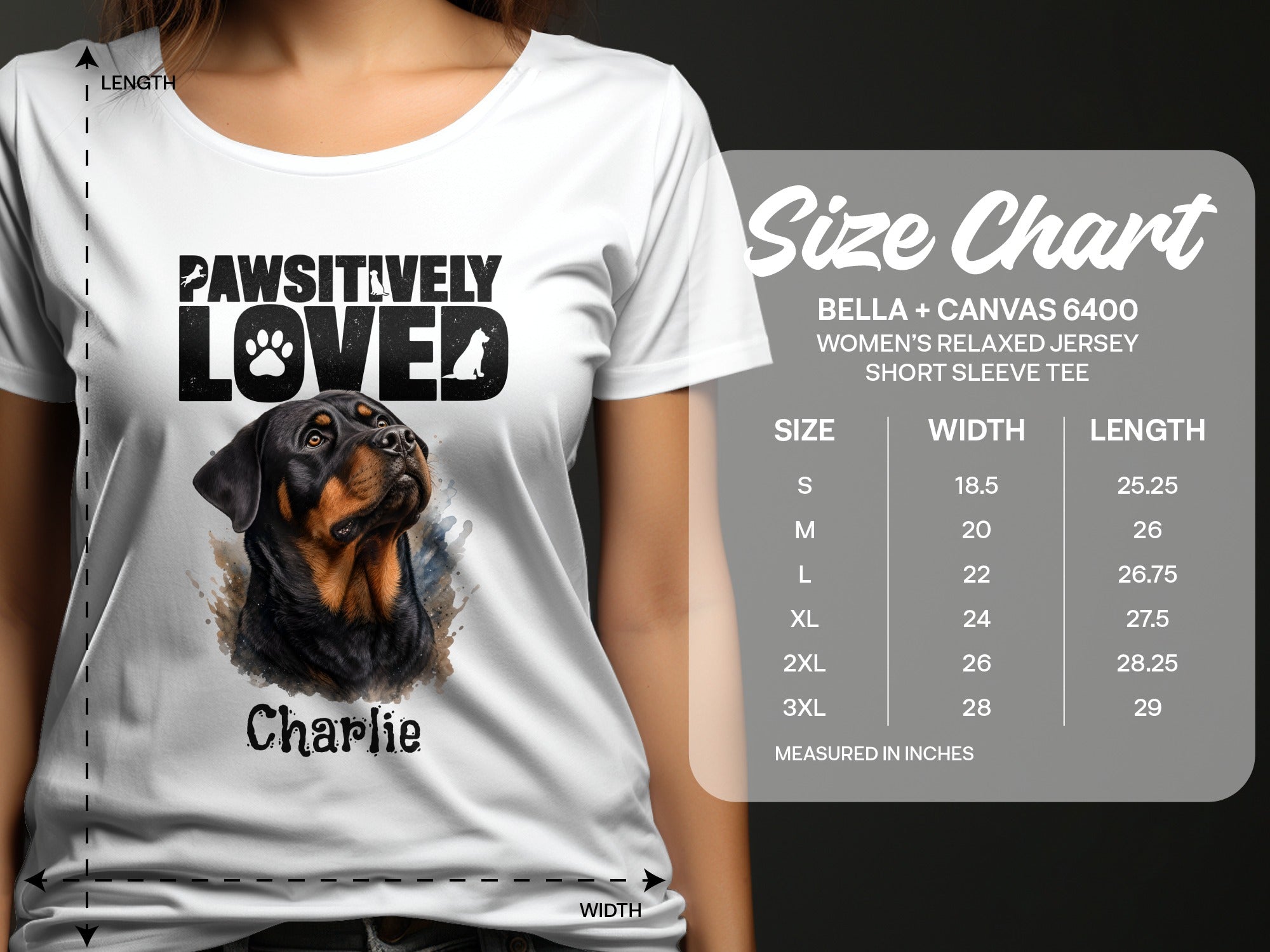 White t-shirt with Rottweiler graphic and "Pawsitively Loved" text, size chart included.
