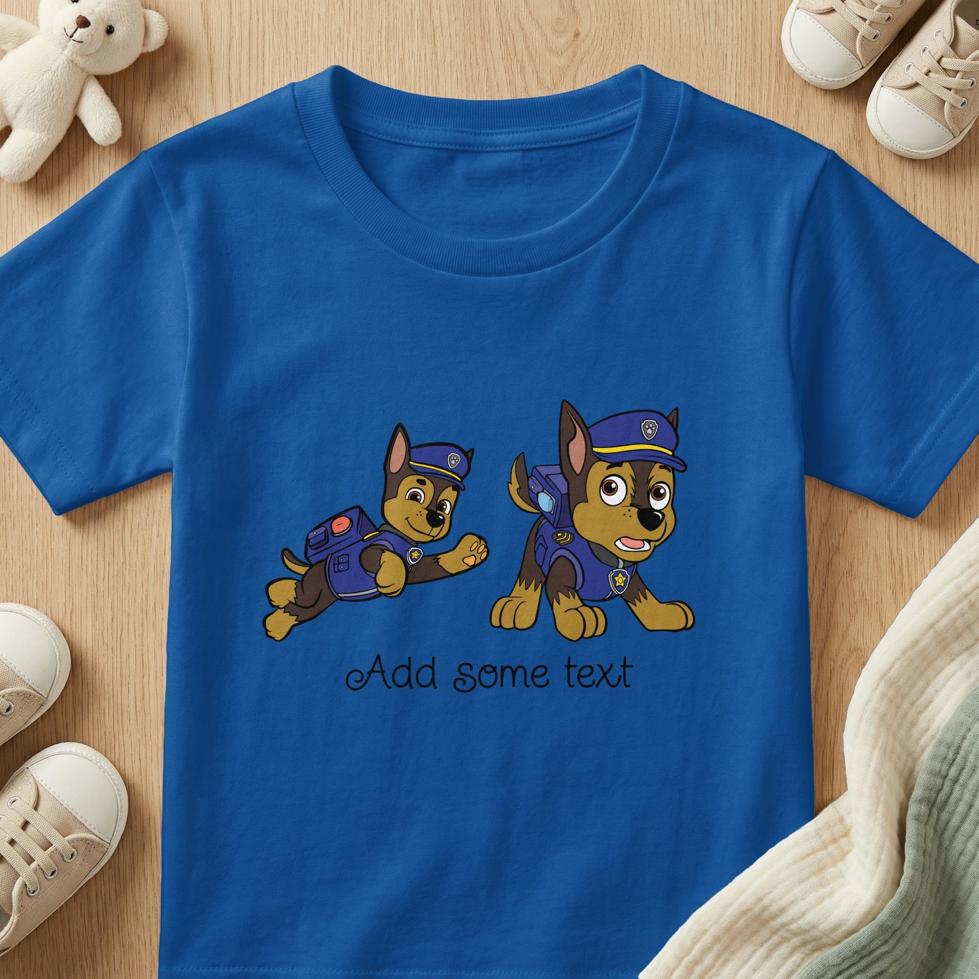 Blue t-shirt with cartoon dogs and "Add some text" slogan.