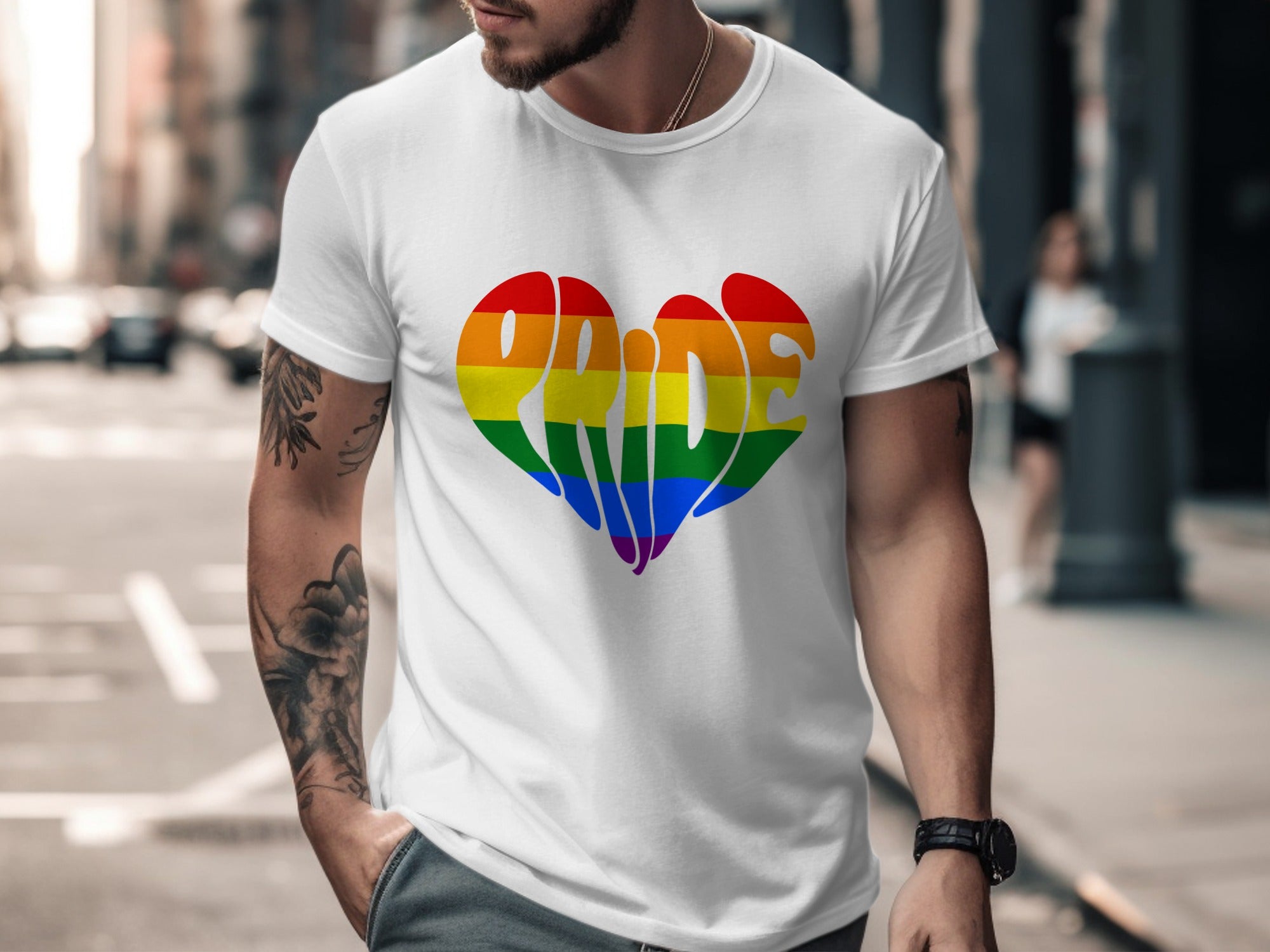 White t-shirt with rainbow pride heart graphic on chest.