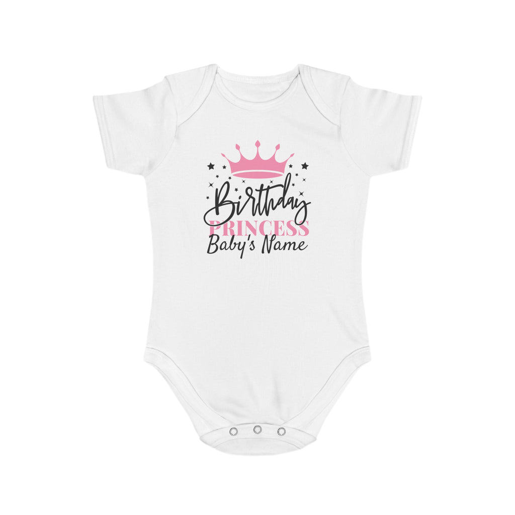 White baby onesie with "Birthday Princess" and placeholder for baby's name.
