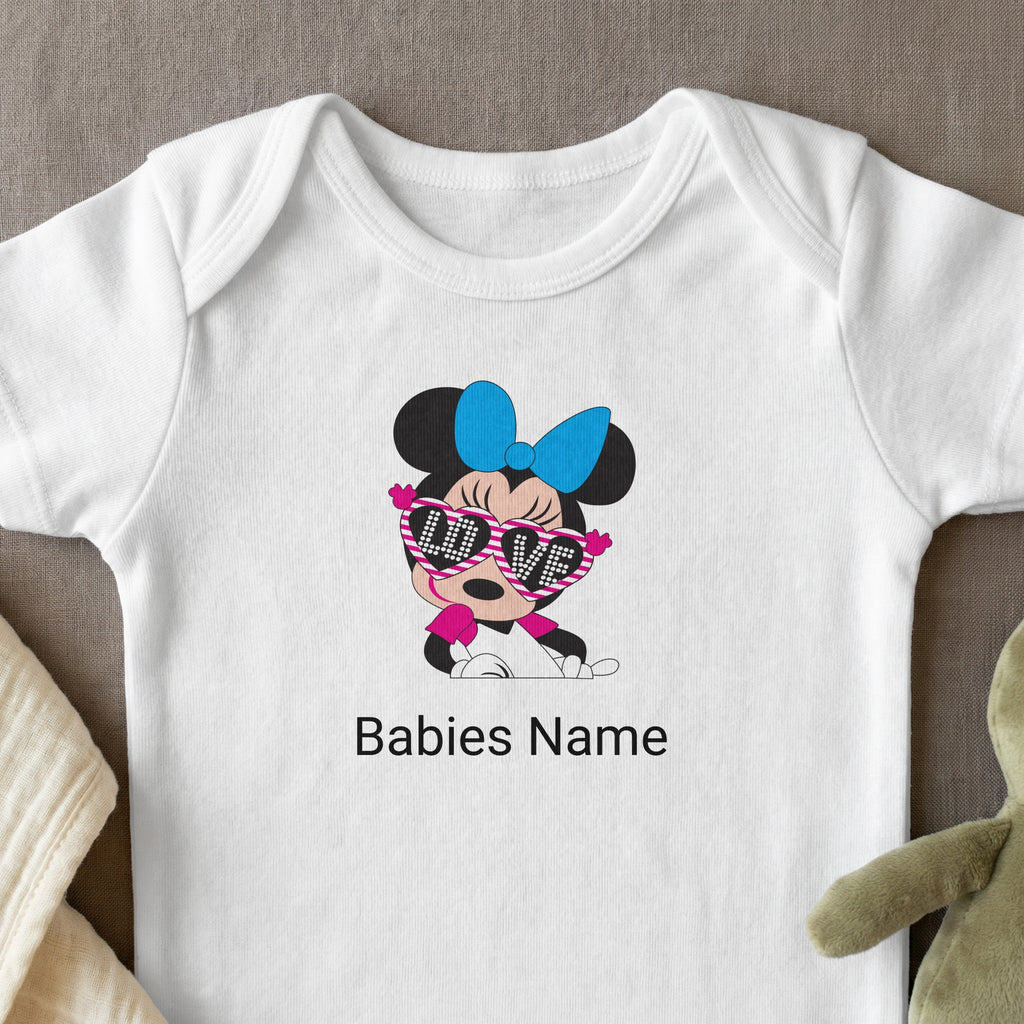 White baby onesie with Minnie Mouse graphic and "Babies Name" text.
