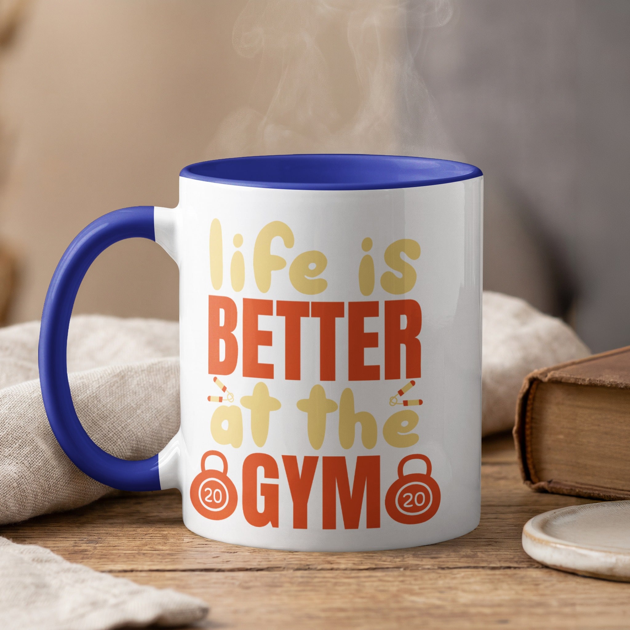 White mug with blue interior, "life is BETTER at the GYM" text.