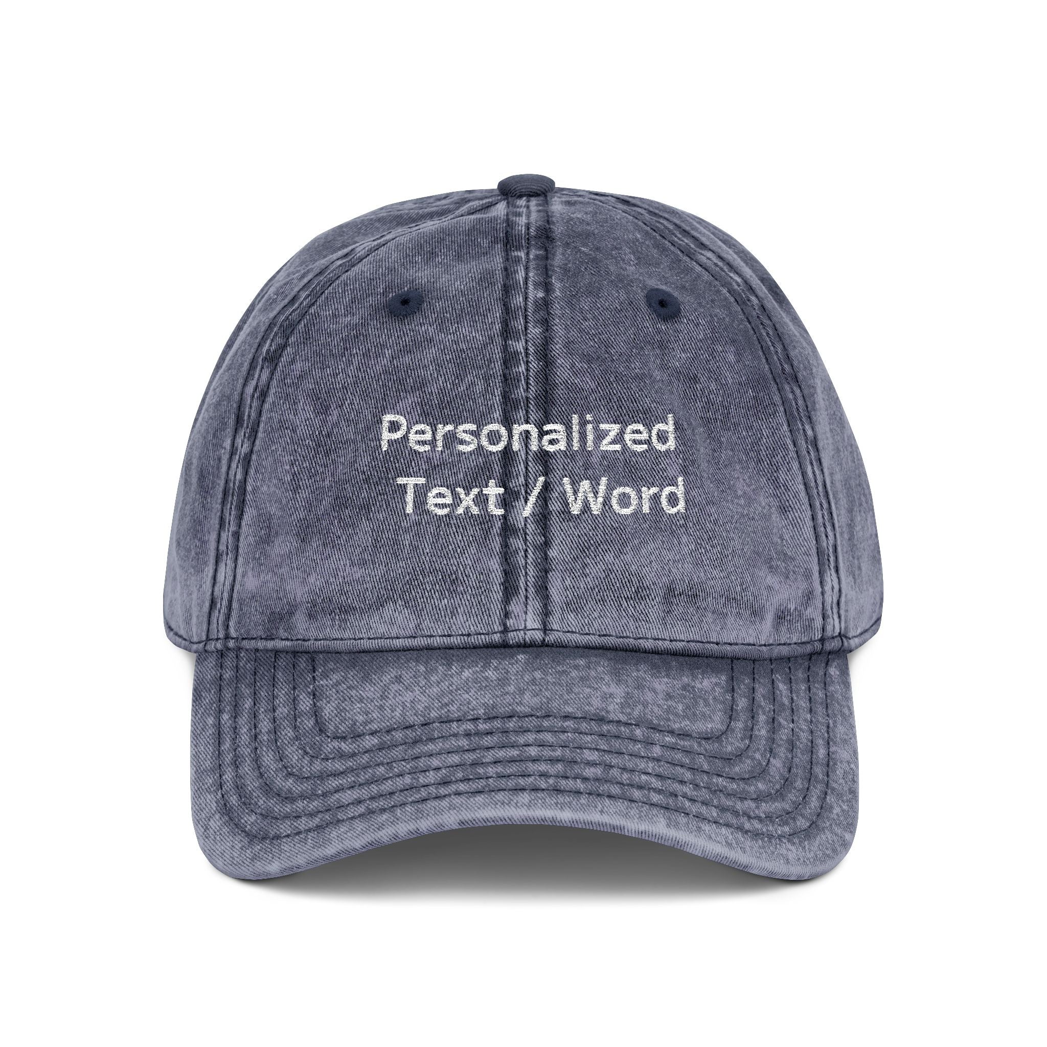 Dark grey washed-out baseball cap with "Personalized Text / Word" embroidered in white.
