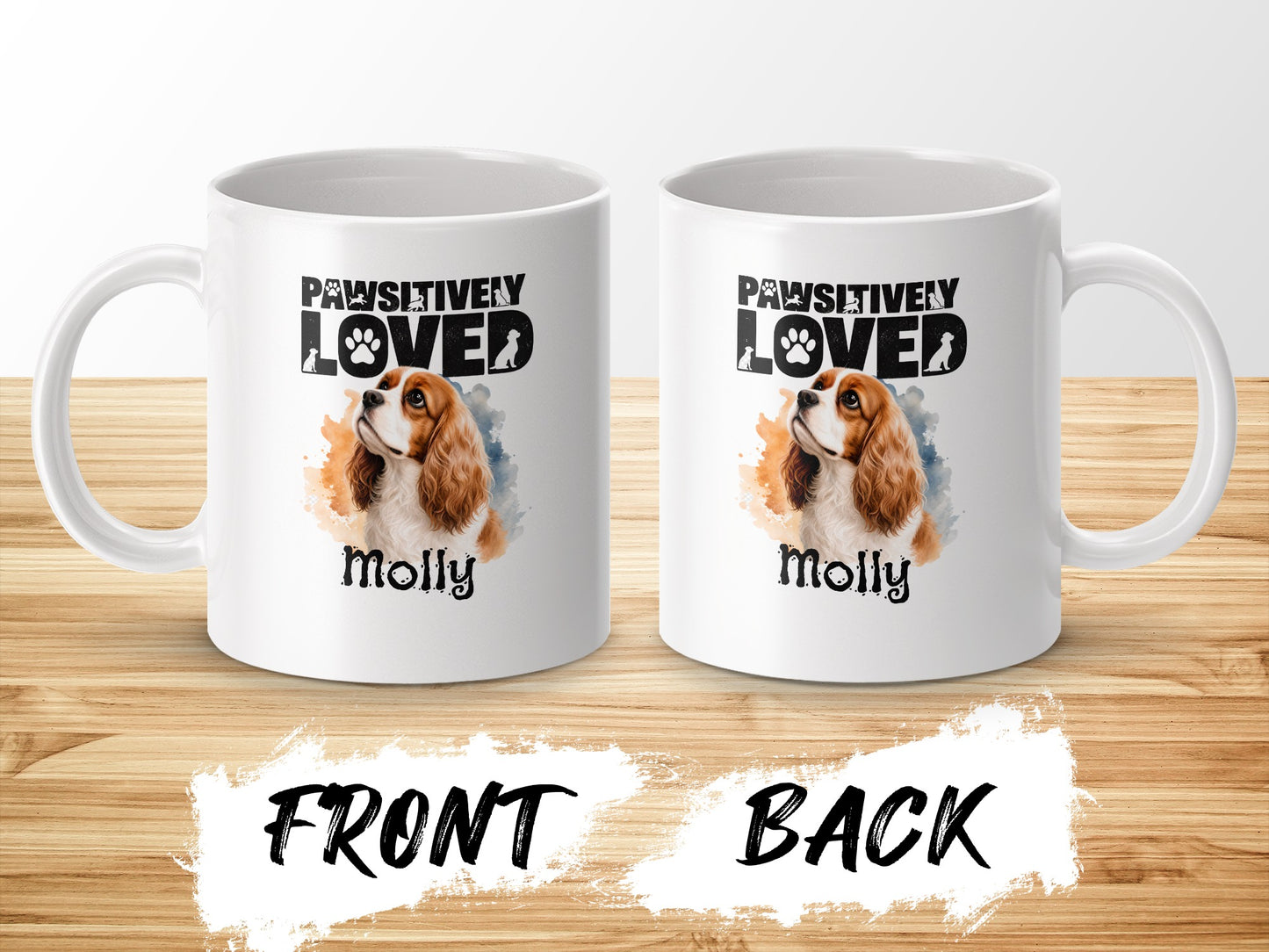 Two white mugs displaying a Cavalier King Charles Spaniel image and "Pawsitively Loved Molly."