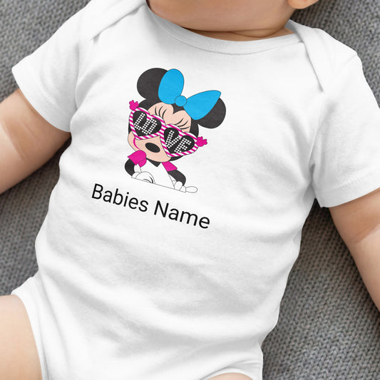 White baby onesie with Minnie Mouse graphic wearing sunglasses and "Babies Name" text.