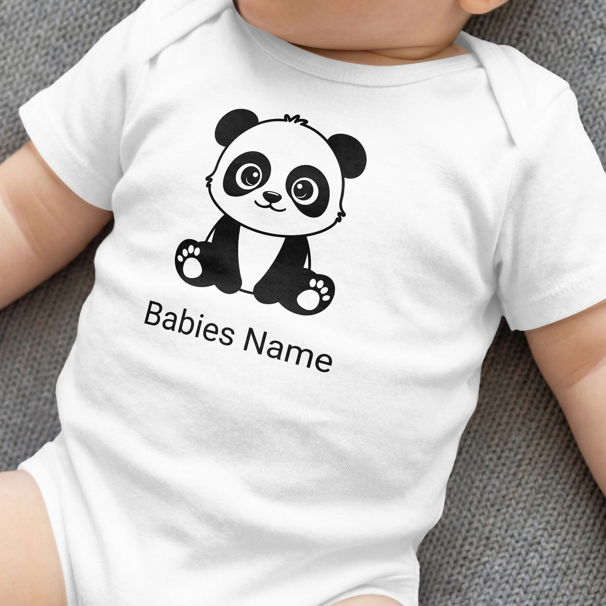 White baby onesie with a cartoon panda and "Babies Name" text.
