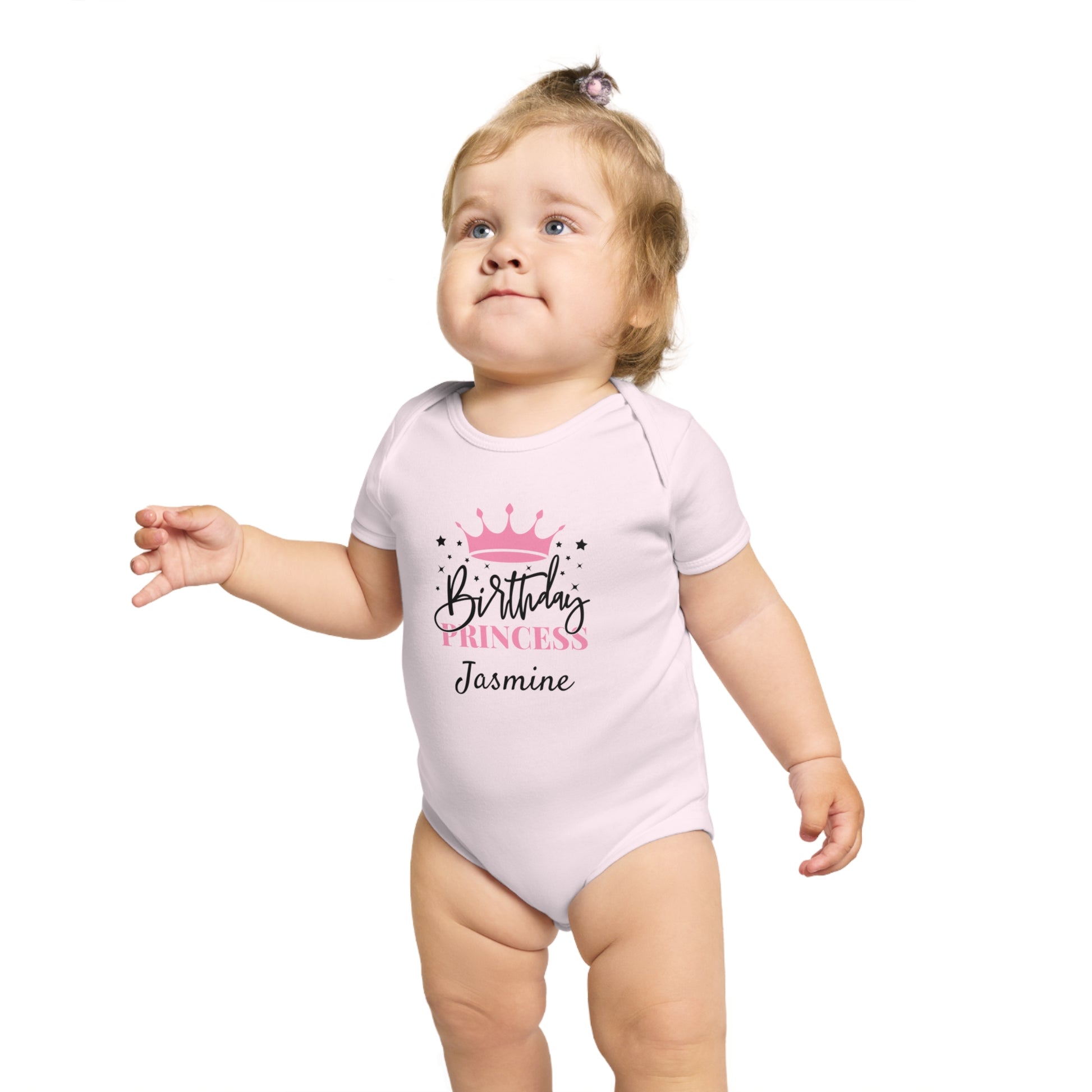 Pink baby bodysuit with "Birthday Princess Jasmine" text and crown graphic.