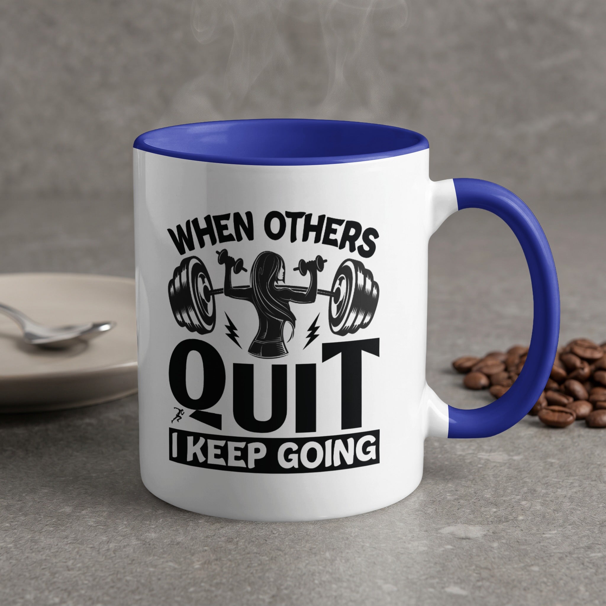 White mug with blue handle, featuring motivational gym text and graphics.