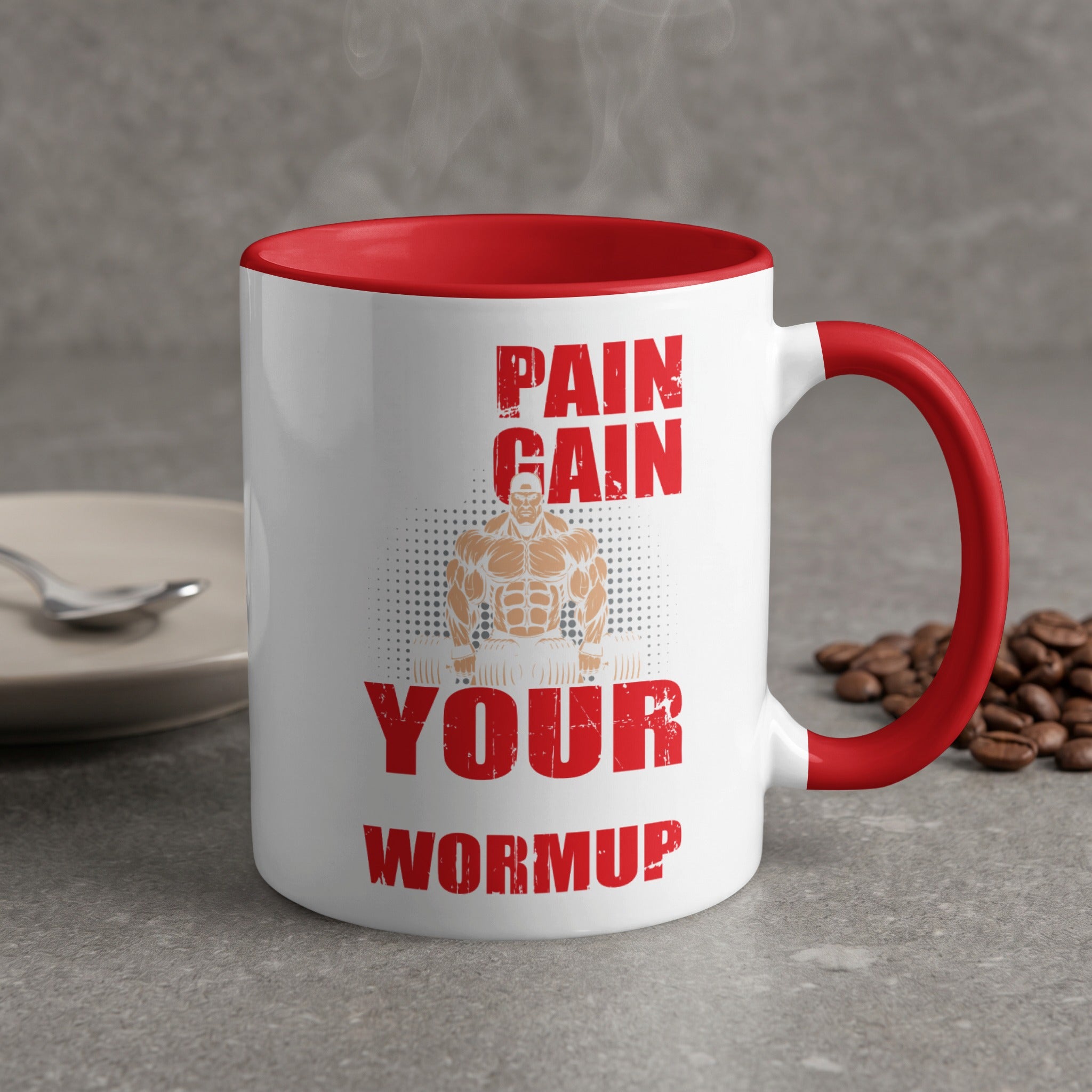 White mug with red rim and handle, featuring "Pain Gain Your Warmup" text and muscular man illustration.