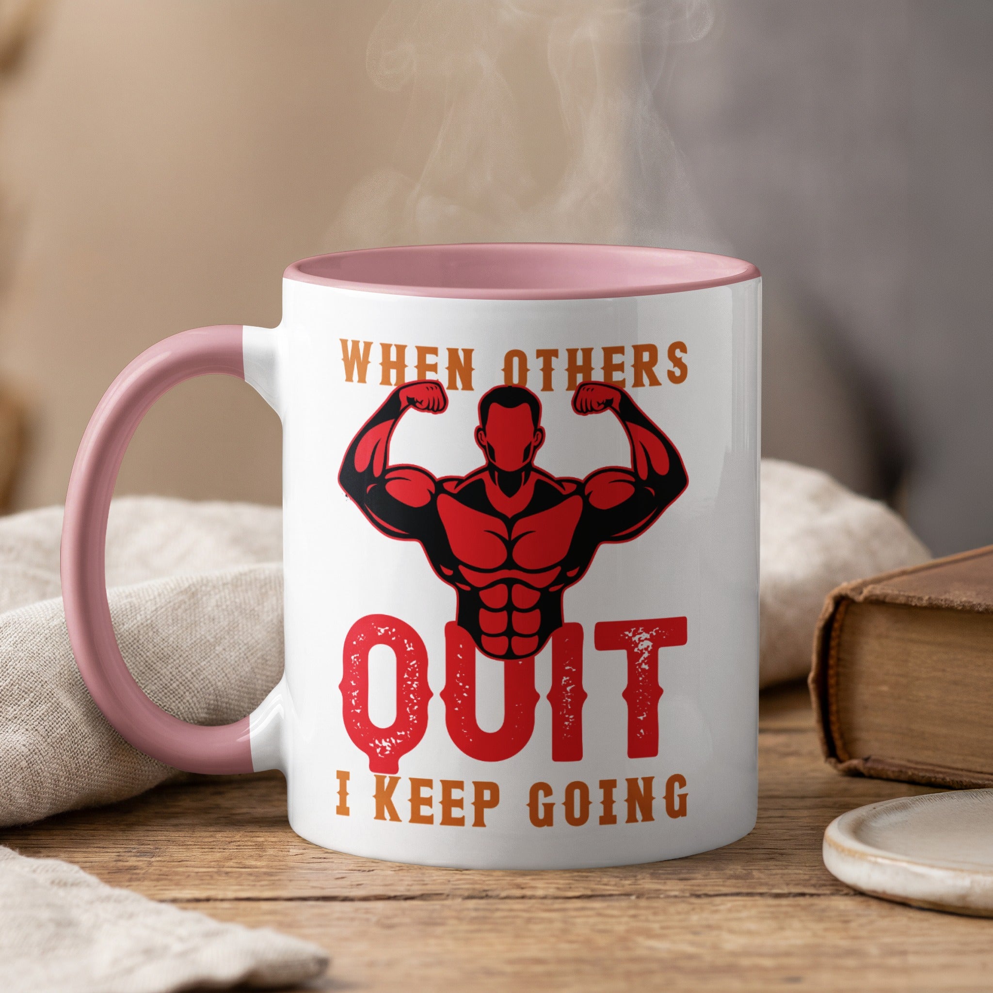Mug with red barbell muscle man and text "When others quit I keep going".