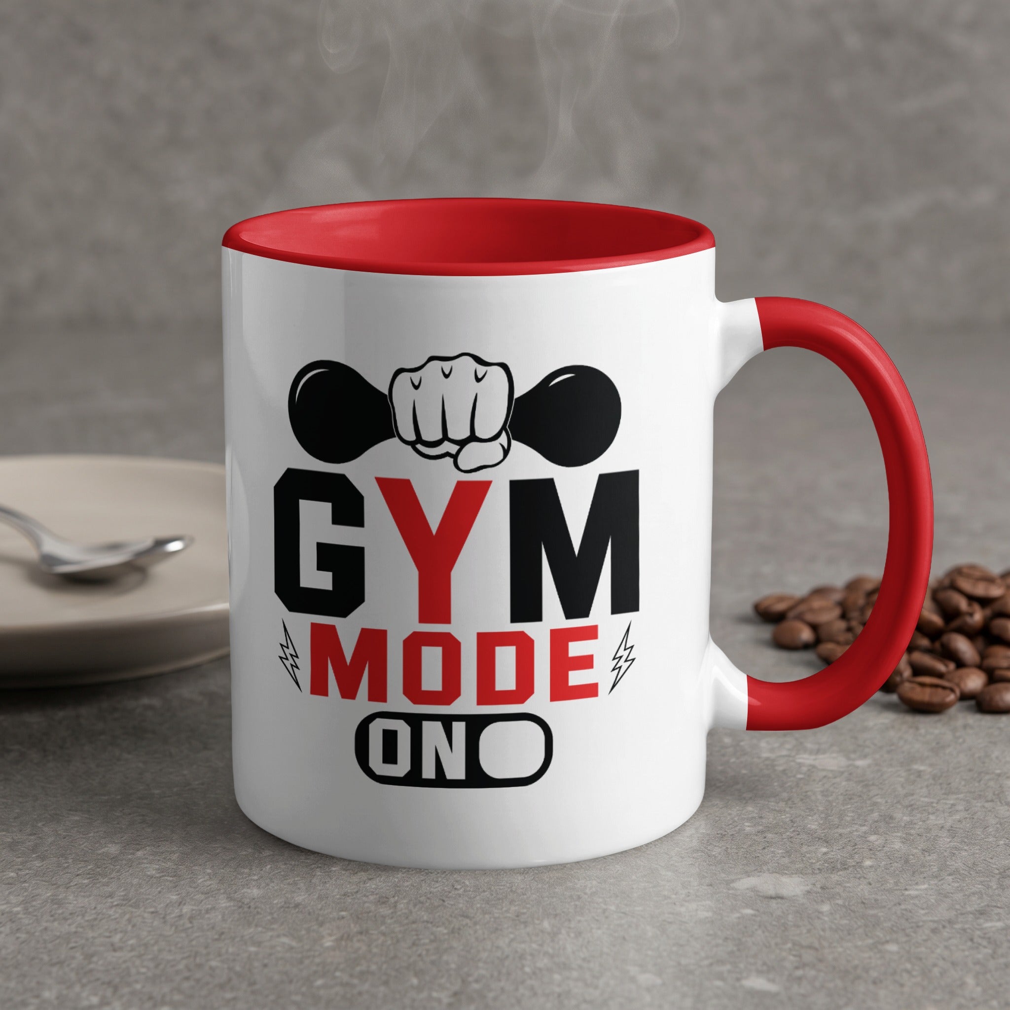 White mug with red handle, "Gym Mode On" text, and dumbbell graphic.