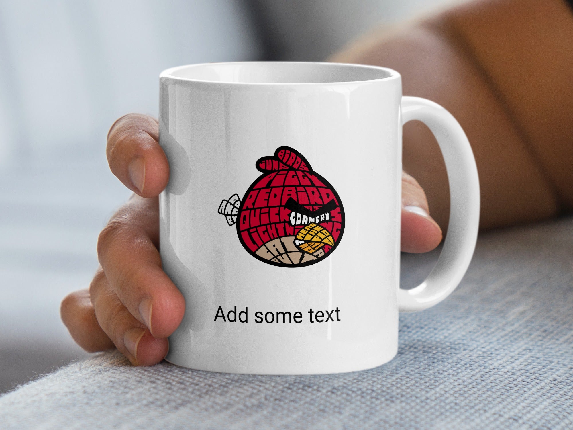 White mug with Angry Bird design and "Add some text" placeholder.