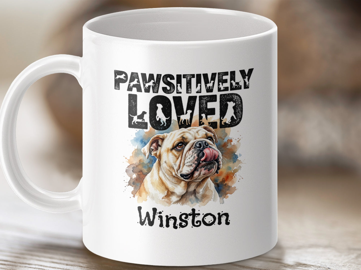 White mug with "Pawsitively Loved" text and an English bulldog illustration named Winston.