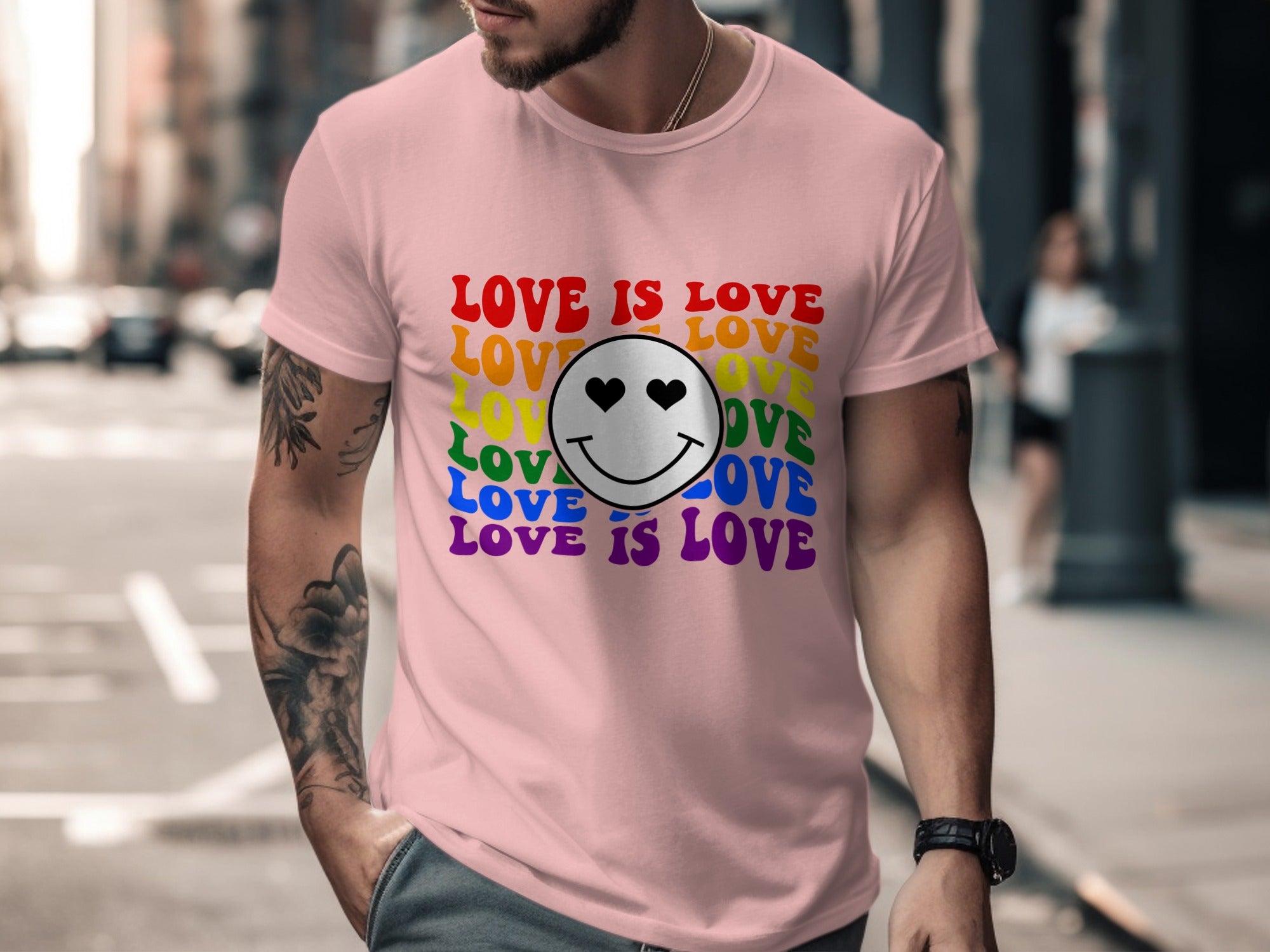 Pink t-shirt with "Love is Love" text and rainbow smiley face graphic.