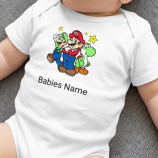 White baby onesie with Mario, Luigi, and Yoshi characters and "Babies Name" text.