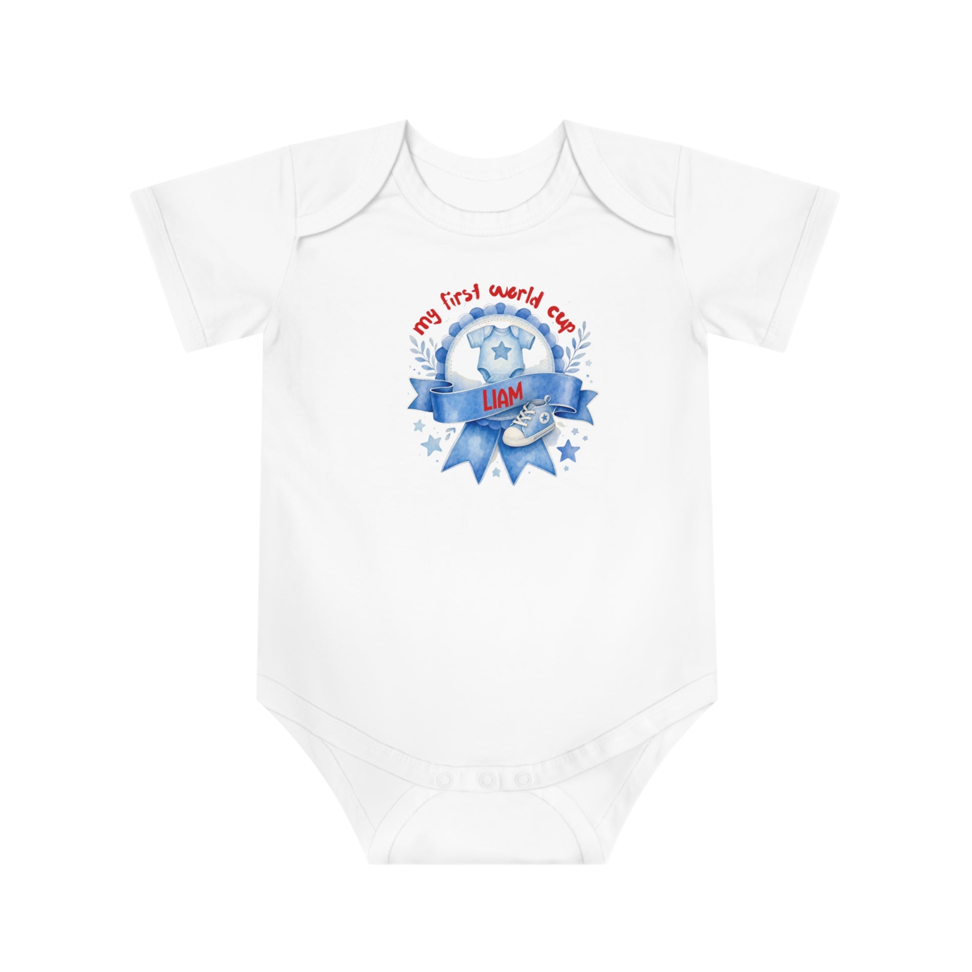 White baby onesie with "my first world cup" text and a soccer theme graphic.
