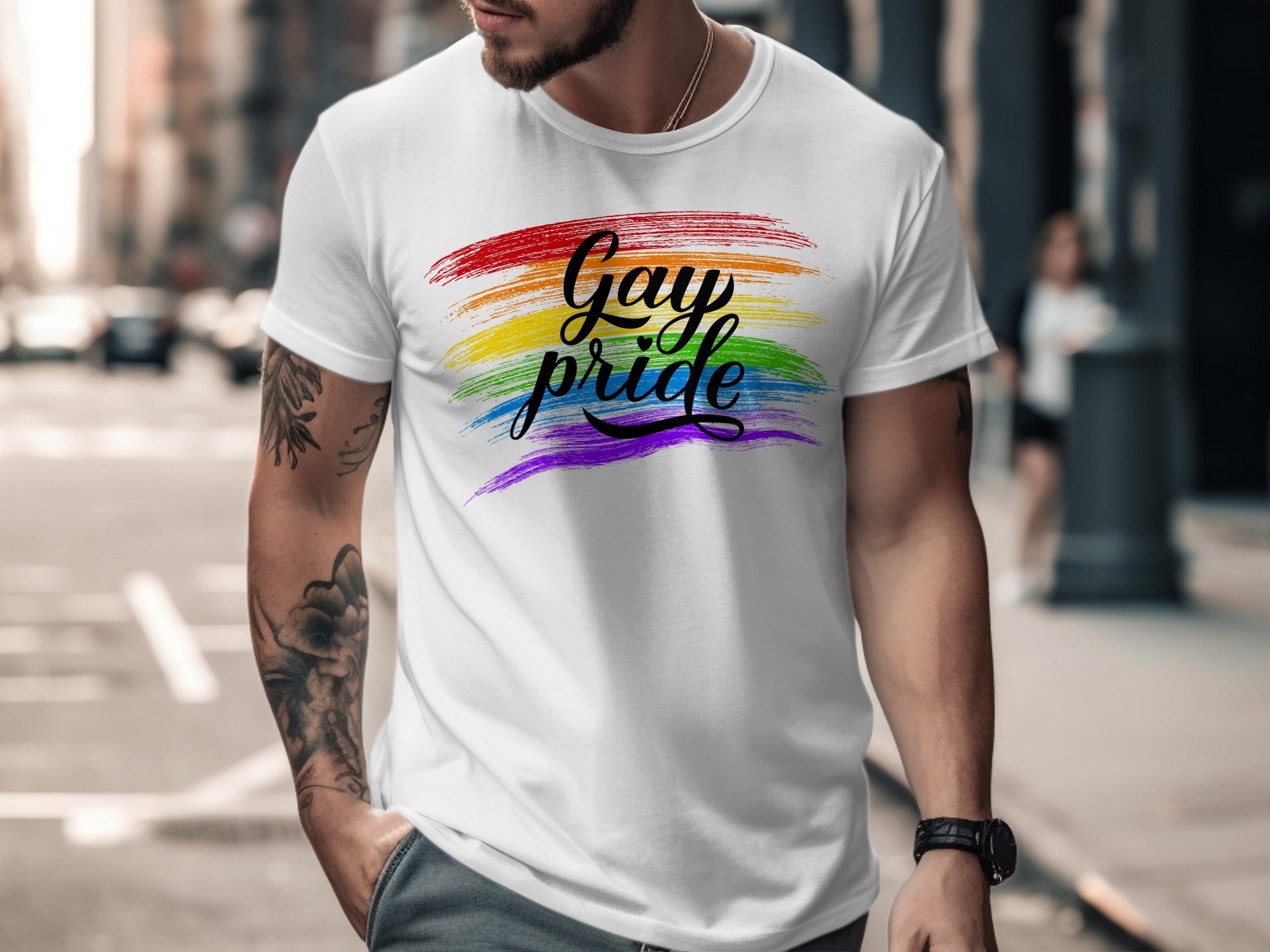 White t-shirt with rainbow brush strokes and "Gay pride" text in black script.