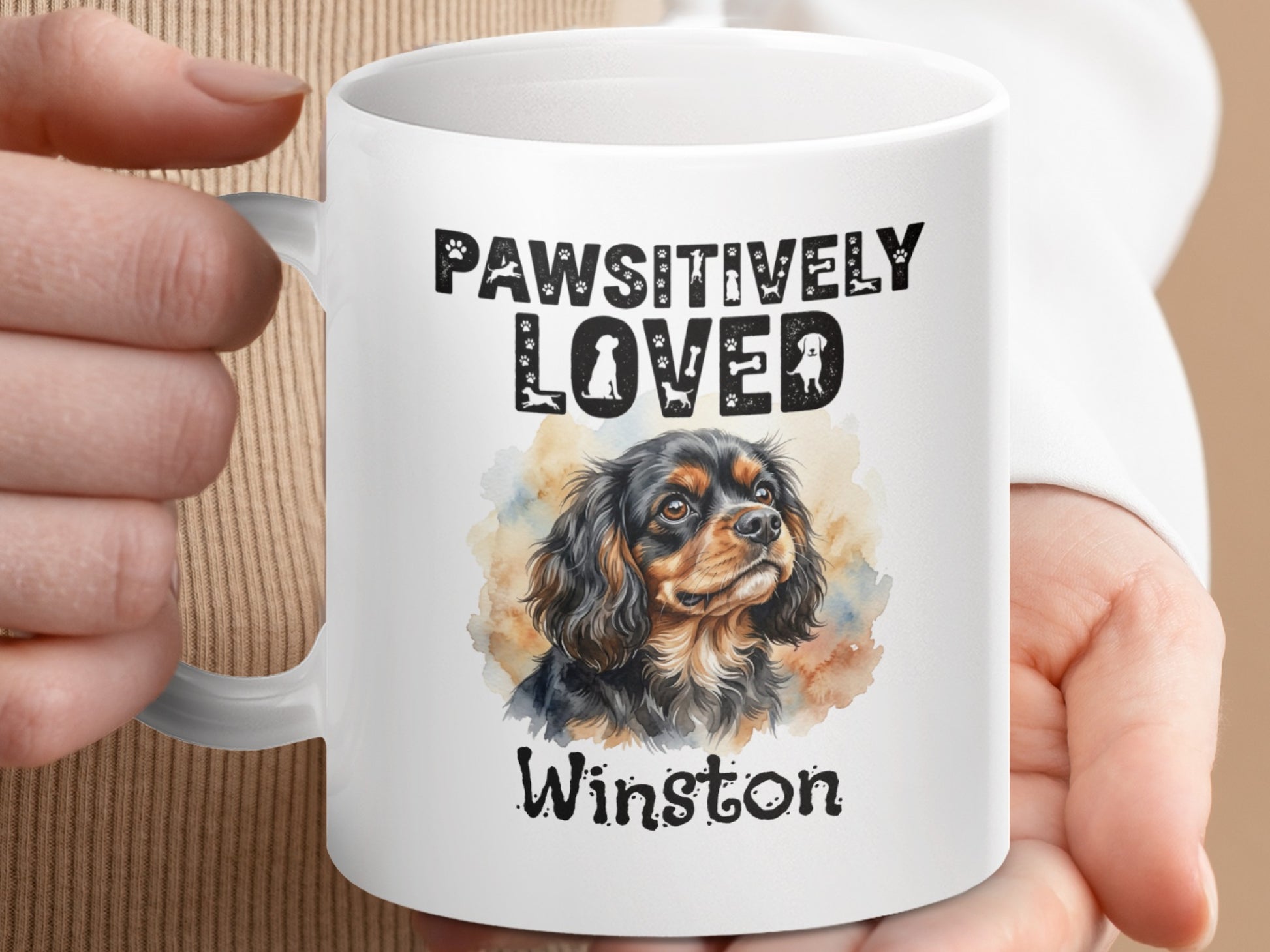 White mug with "PAWSITIVELY LOVED" text, dog art, and "Winston" name.