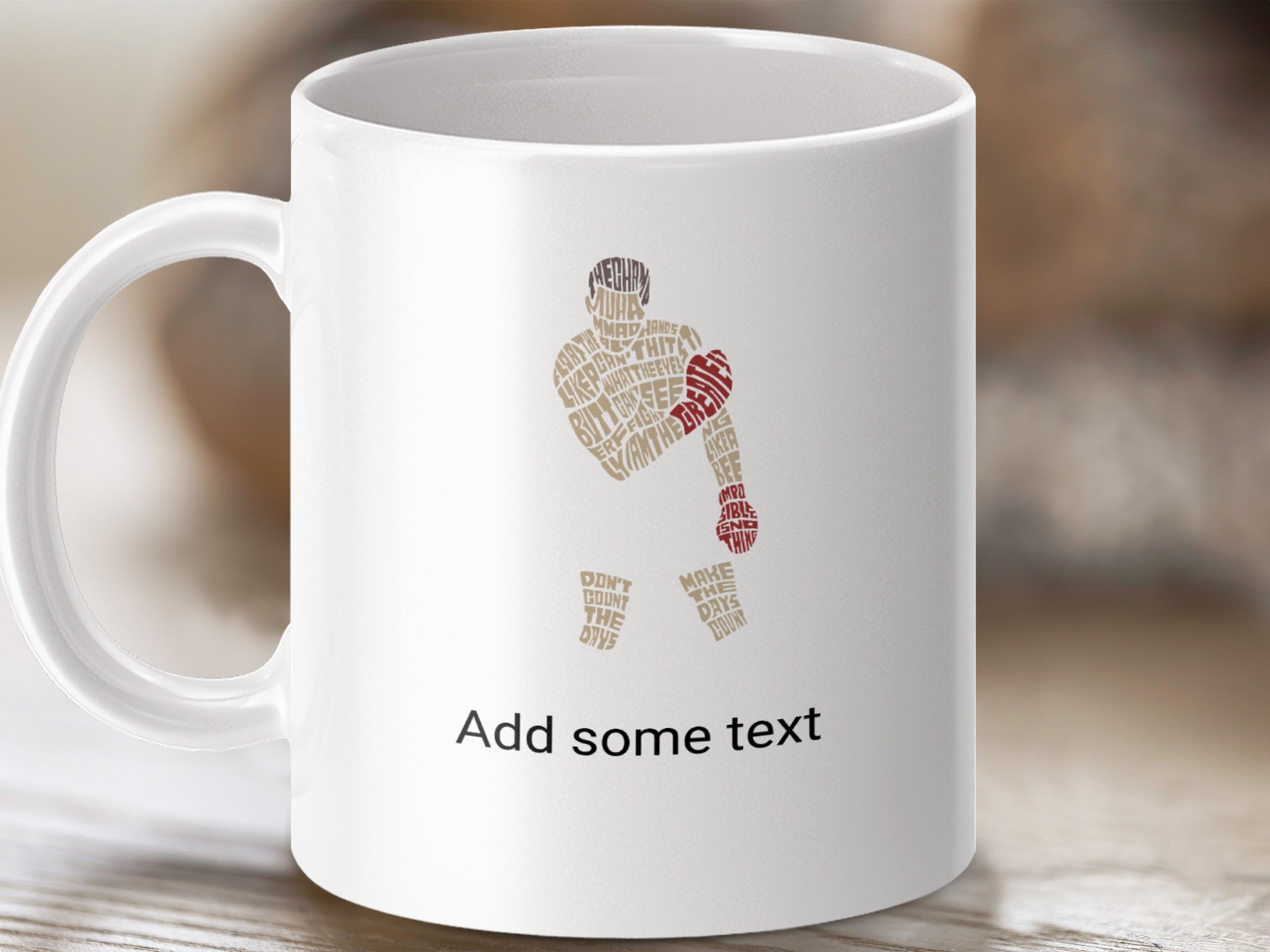White mug with abstract text art of a boxer and motivational phrases.