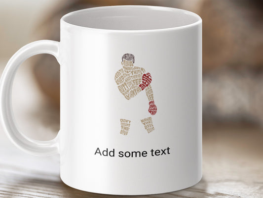White mug with abstract text art of a boxer and motivational phrases.