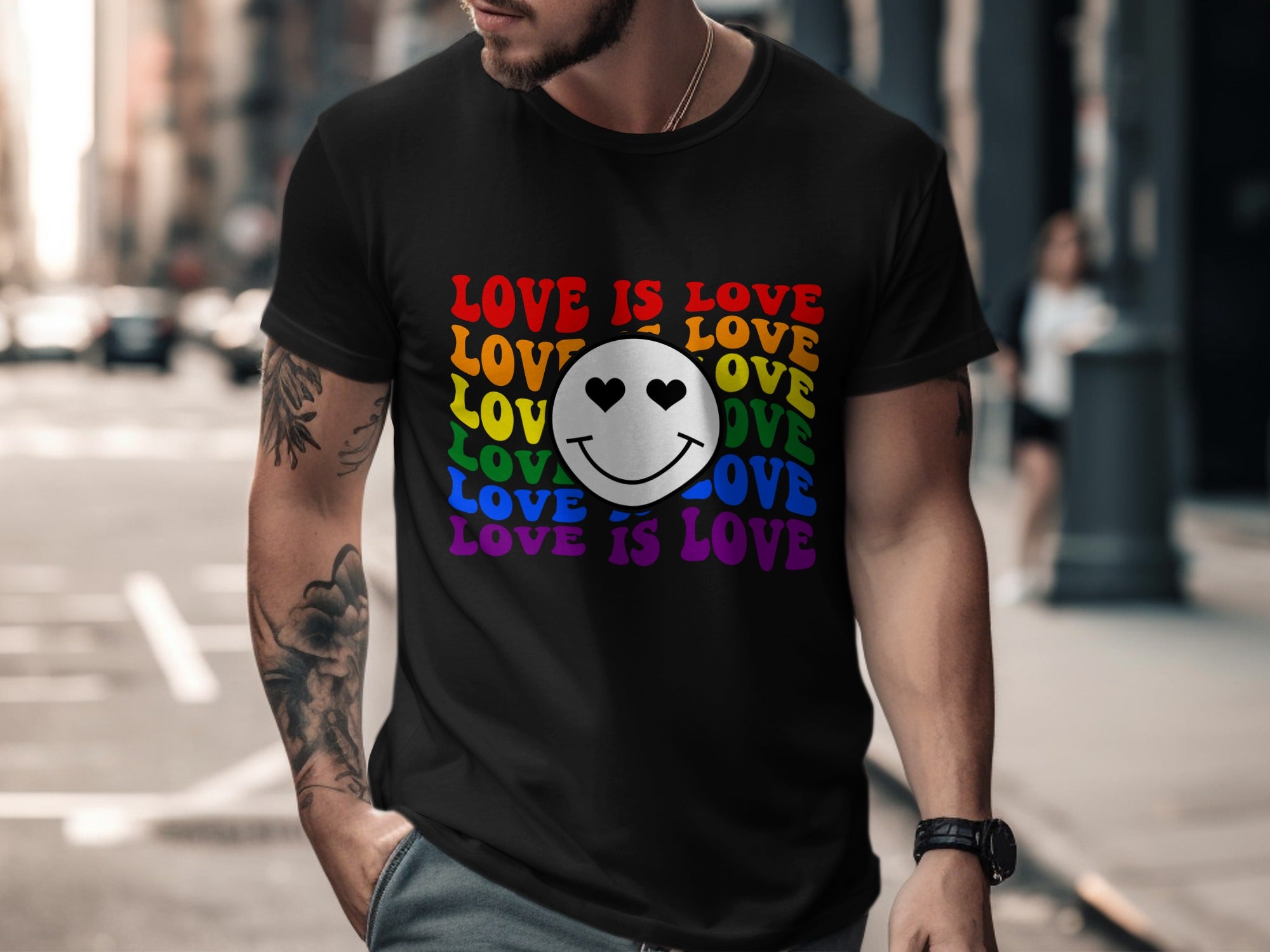 Black t-shirt with "LOVE IS LOVE" text and rainbow-colored smiley face with heart eyes.