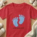 Red t-shirt with blue baby footprints and "Add some text" personalization.